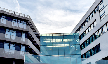 Modern building representing Graha Pravesh best service and property results in Indore